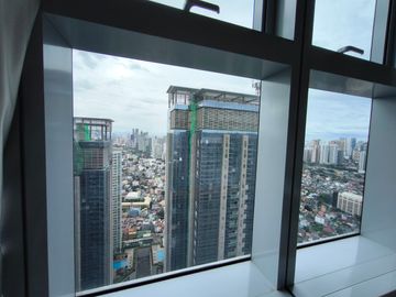2BR condo at Uptown Parksuites Tower 1 - High floor unit with city view