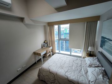 2BR condo at Uptown Parksuites Tower 1 - High floor unit with city view