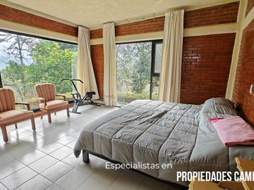 FINCA CON BOSQUE Y RÍO DE 25 HECTÁREAS