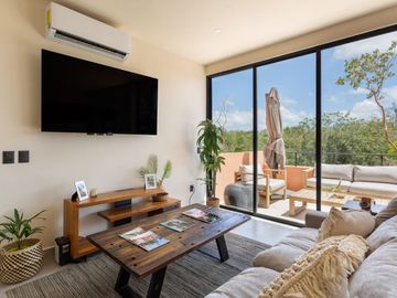Departamento en venta en Tulum, residencial con alberca y cancha de padel