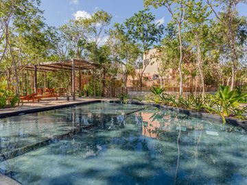 Departamento en venta en Tulum, residencial con alberca y cancha de padel