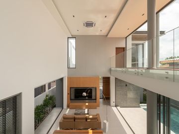 Modern pool villa house for sale with double volume and spacious outdoor party located in the middle of city only 5 mins from Nimman