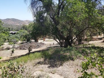 HERMOSA PARCELA CON CASA EN CONDOMINIO CONSOLIDADO