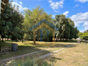 Hermoso campo de 1,25 hectáreas con casa de madera nativa y árboles frutales en Casma, Frutillar