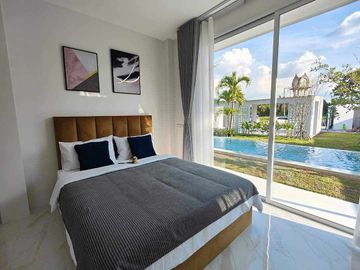 Modern Luxury Private Pool Villa for sale, surrounded by natural garden, a local quiet village and convenient stores.