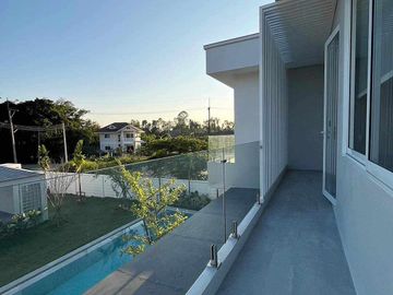 Modern Luxury Private Pool Villa for sale, surrounded by natural garden, a local quiet village and convenient stores.