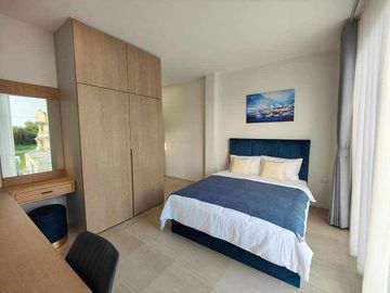 Modern Luxury Private Pool Villa for sale, surrounded by natural garden, a local quiet village and convenient stores.