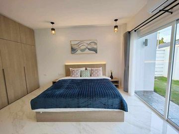 Modern Luxury Private Pool Villa for sale, surrounded by natural garden, a local quiet village and convenient stores.
