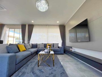 Modern Luxury Private Pool Villa for sale, surrounded by natural garden, a local quiet village and convenient stores.