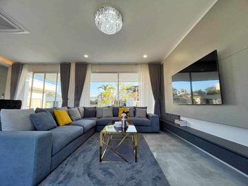 Modern Luxury Private Pool Villa for sale, surrounded by natural garden, a local quiet village and convenient stores.