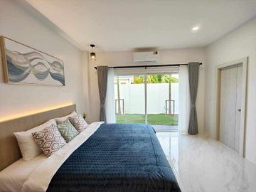 Modern Luxury Private Pool Villa for sale, surrounded by natural garden, a local quiet village and convenient stores.