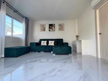 Modern Luxury Private Pool Villa for sale, surrounded by natural garden, a local quiet village and convenient stores.