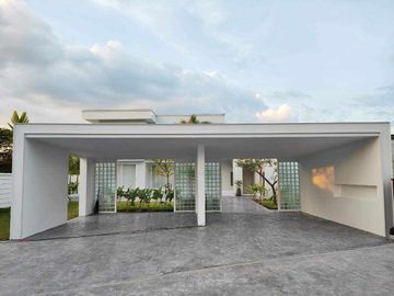 Modern Luxury Private Pool Villa for sale, surrounded by natural garden, a local quiet village and convenient stores.