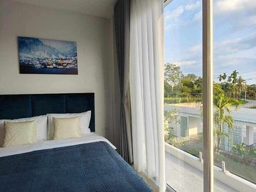 Modern Luxury Private Pool Villa for sale, surrounded by natural garden, a local quiet village and convenient stores.