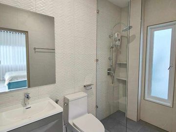 Modern Luxury Private Pool Villa for sale, surrounded by natural garden, a local quiet village and convenient stores.