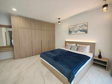 Modern Luxury Private Pool Villa for sale, surrounded by natural garden, a local quiet village and convenient stores.