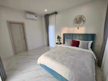 Modern Luxury Private Pool Villa for sale, surrounded by natural garden, a local quiet village and convenient stores.