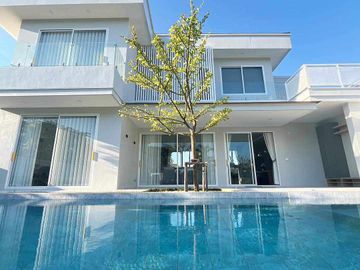 Modern Luxury Private Pool Villa for sale, surrounded by natural garden, a local quiet village and convenient stores.