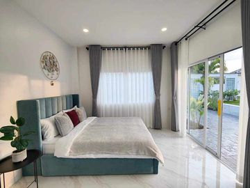 Modern Luxury Private Pool Villa for sale, surrounded by natural garden, a local quiet village and convenient stores.