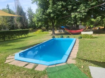Venta parcela con Casas y plantación de arandanos