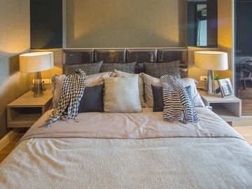 The Next 3 Ruamchok Condo, 2 Bedrooms, 2 Bathrooms, Conveniently located near various amenities such as shopping malls, hospitals, and universities.