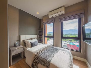 The Next 3 Ruamchok Condo, 2 Bedrooms, 2 Bathrooms, Conveniently located near various amenities such as shopping malls, hospitals, and universities.