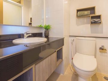 The Next 3 Ruamchok Condo, 2 Bedrooms, 2 Bathrooms, Conveniently located near various amenities such as shopping malls, hospitals, and universities.