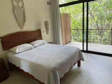 Depa 2 recs amueblado y decorado en Tulum: 2 albercas y áreas verdes.