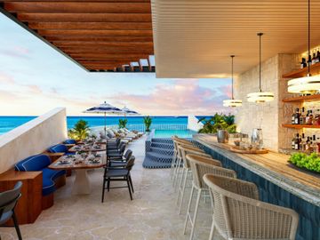 EXCLUSIVO DEPARTAMENTO FRENTE AL MAR DE PLAYA DEL CARMEN