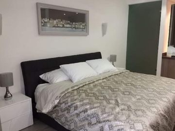 DEPARTAMENTO EN VENTA MAREA 34 PLAYA DEL CARMEN,  A PASOS DE LA 5TA AV.