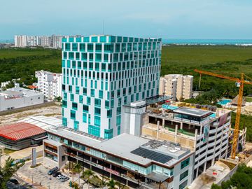 Departamento en corazón de Cancún con vista a la laguna y mar caribe (CESN KUN)