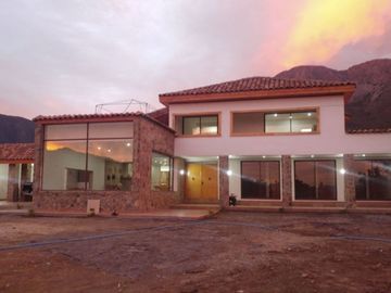 PARCELA CON CASA VISTA HERMOSA EN CONDOMINIO LA AURORA