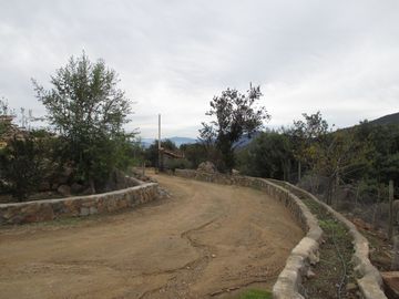 PARCELA CON CASA VISTA HERMOSA EN CONDOMINIO LA AURORA