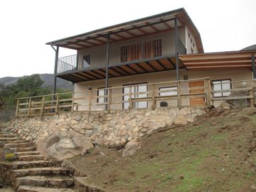 PARCELA CON CASA VISTA HERMOSA EN CONDOMINIO LA AURORA