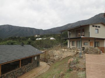 PARCELA CON CASA VISTA HERMOSA EN CONDOMINIO LA AURORA
