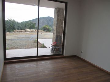 PARCELA CON CASA VISTA HERMOSA EN CONDOMINIO LA AURORA