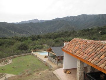PARCELA CON CASA VISTA HERMOSA EN CONDOMINIO LA AURORA
