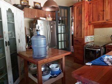 HERMOSA PARCELA CON CASA EN CONDOMINIO LA AURORA