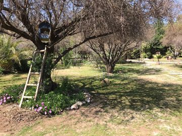 HERMOSA PARCELA CON CASA EN CONDOMINIO LA AURORA