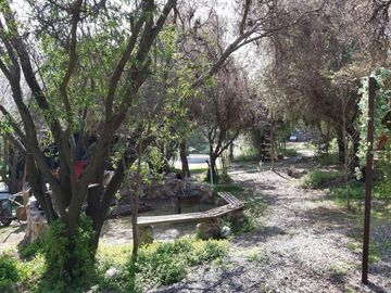 HERMOSA PARCELA CON CASA EN CONDOMINIO LA AURORA