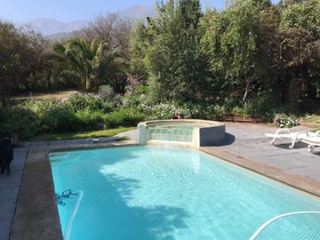 HERMOSA PARCELA CON CASA EN CONDOMINIO LA AURORA