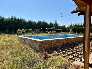 Parcela en Melipilla! con 2 Casas de 357 m2 más terreno de 5.000 m2. Condominio Las Flores.