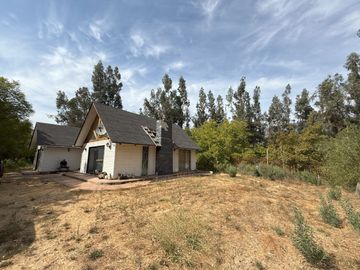 Soñada Parcela de 20.000 m2 con Casa Regularizada y Diversos Árboles Frutales