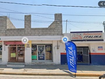 Propiedad con locales abajo en remate bancario. SK11