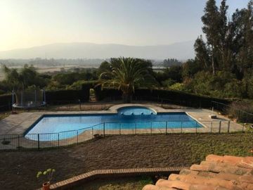 PARCELA EN CONDOMINIO VALLE DEL HUINGANAL CON PRECIOSA CASA PATRONAL