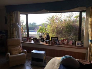 PARCELA EN CONDOMINIO VALLE DEL HUINGANAL CON PRECIOSA CASA PATRONAL