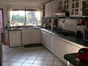PARCELA EN CONDOMINIO VALLE DEL HUINGANAL CON PRECIOSA CASA PATRONAL