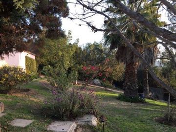 PARCELA EN CONDOMINIO VALLE DEL HUINGANAL CON PRECIOSA CASA PATRONAL
