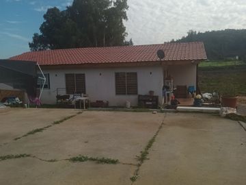 Parcela con casa 5.000/130 m2