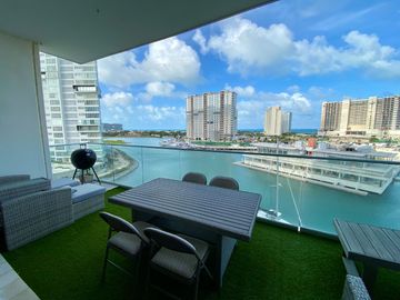 DEPARTAMENTO AMUEBLADO EN ARIA, PUERTO CANCUN, VISTA AL MAR Y LOS CANALES